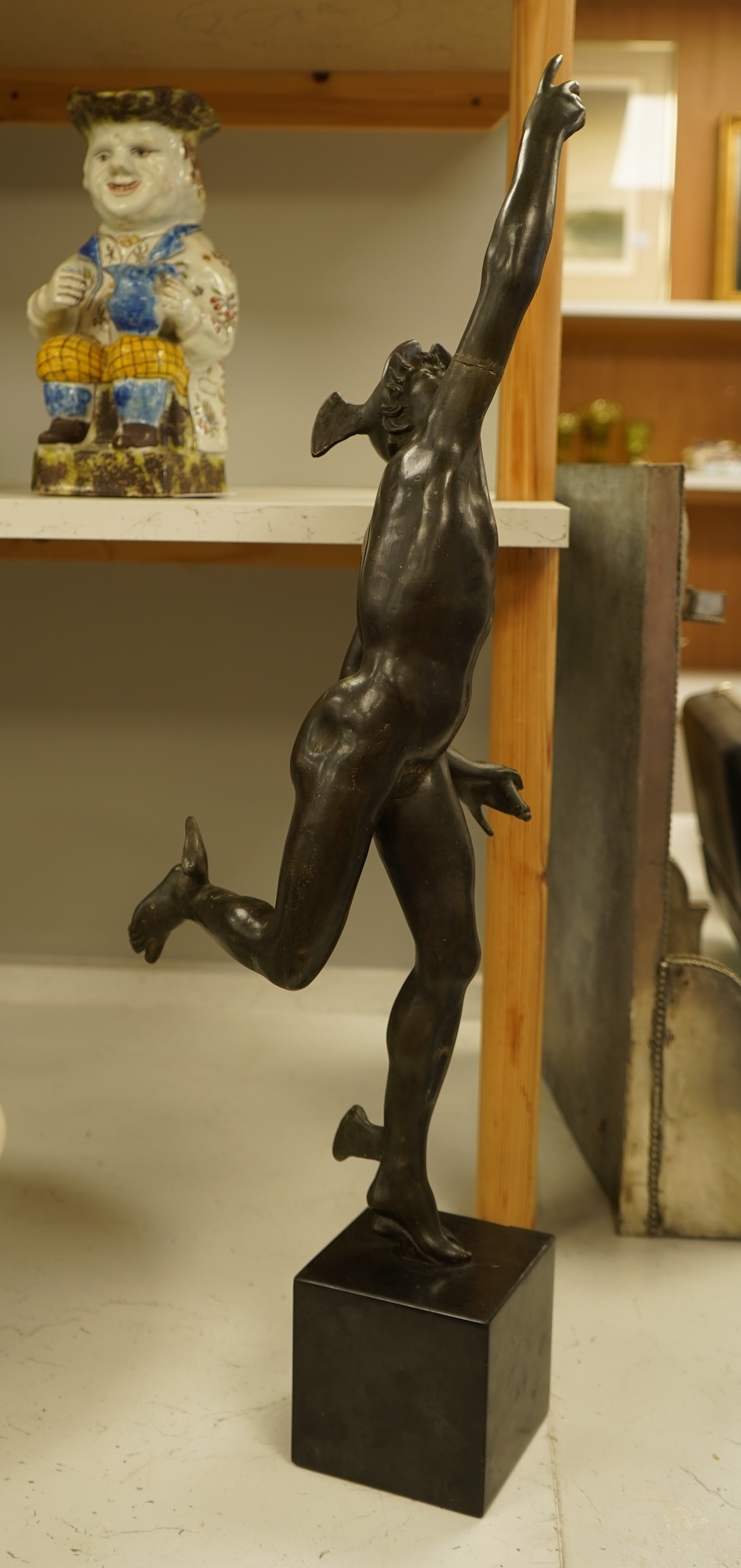 After the antique, a bronze study of Mercury raised on square base, 70cm high